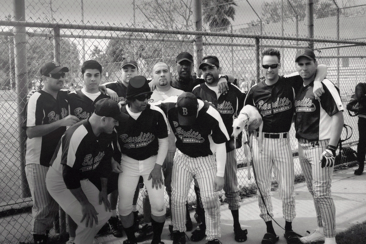 BUTT - L.A., by Dino DincoWe present to you: the Los Angeles Bandits, photographed fresh after losing a game to some other gays. The Bandits are a gay softball team formed by a group of friends. From left to right: Christopher, Anthony, Alex, Martin, Philip, Alfredo, Fiona (the dog), Jayson and Enrique. Front row: Carlos, Victor and Ru. The Bandits were "a fucking mess" in their first season, but now they're doing quite okay in the C-division of American gay softball.