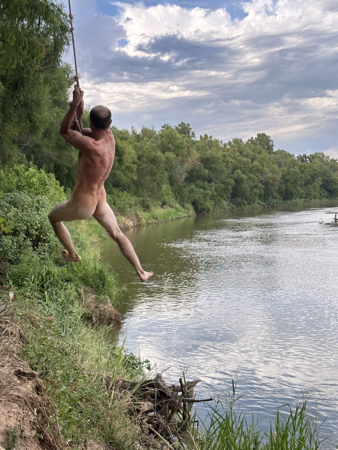 BUTT - Cole swinging on the edge of the red river, 2023