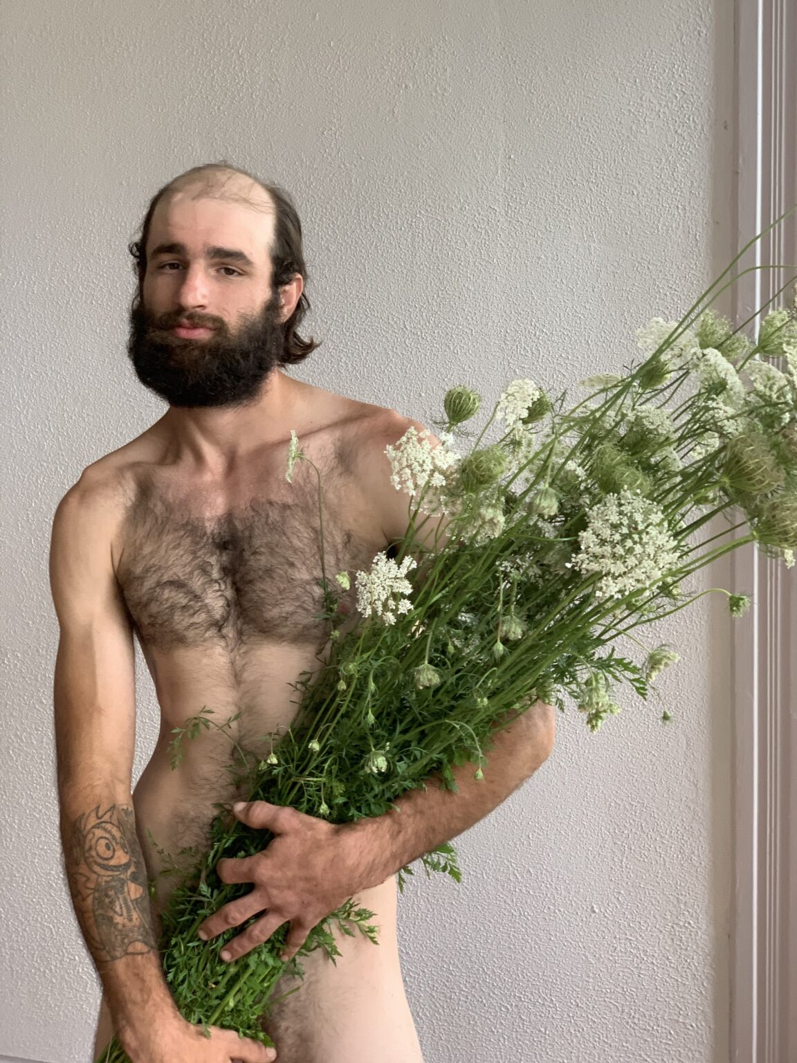 BUTT - Cole holding wildflowers, 2020